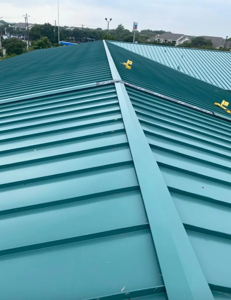 Green commercial metal roof ridge and valley for Metal Roof Repair in Dartmouth